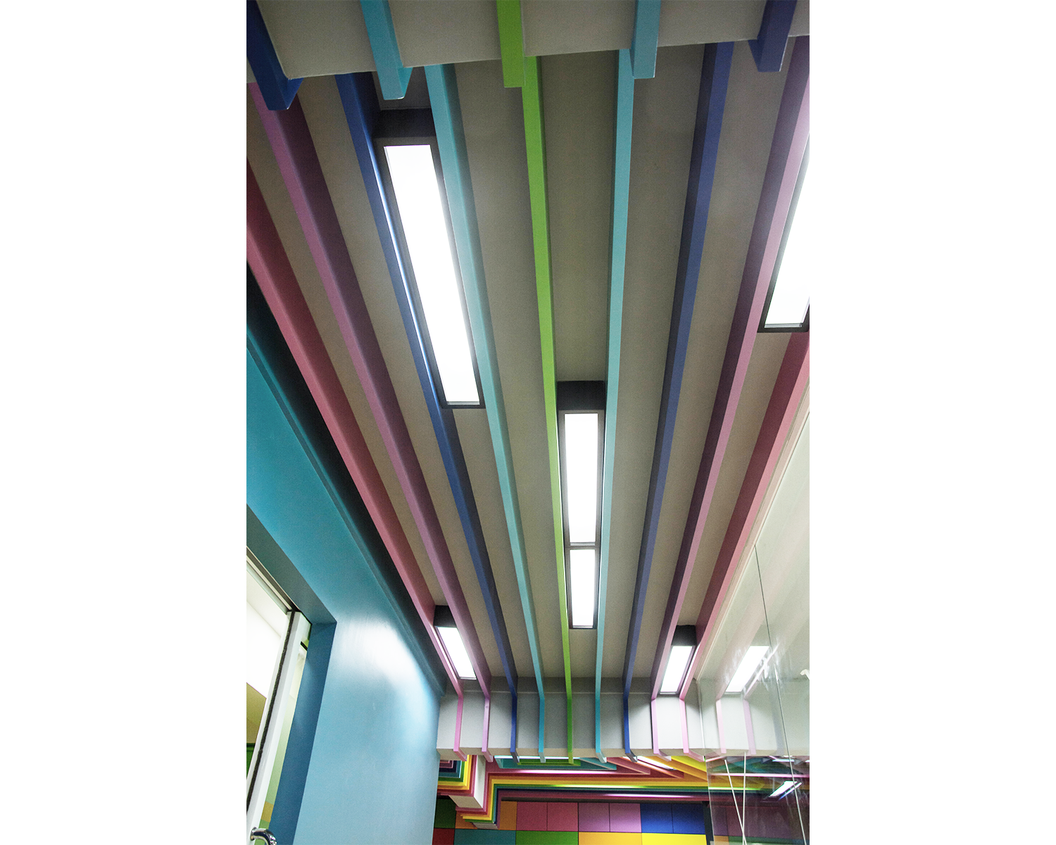 Gym Lighting Black Linear Lights Colourful Slatted Wood Ceiling